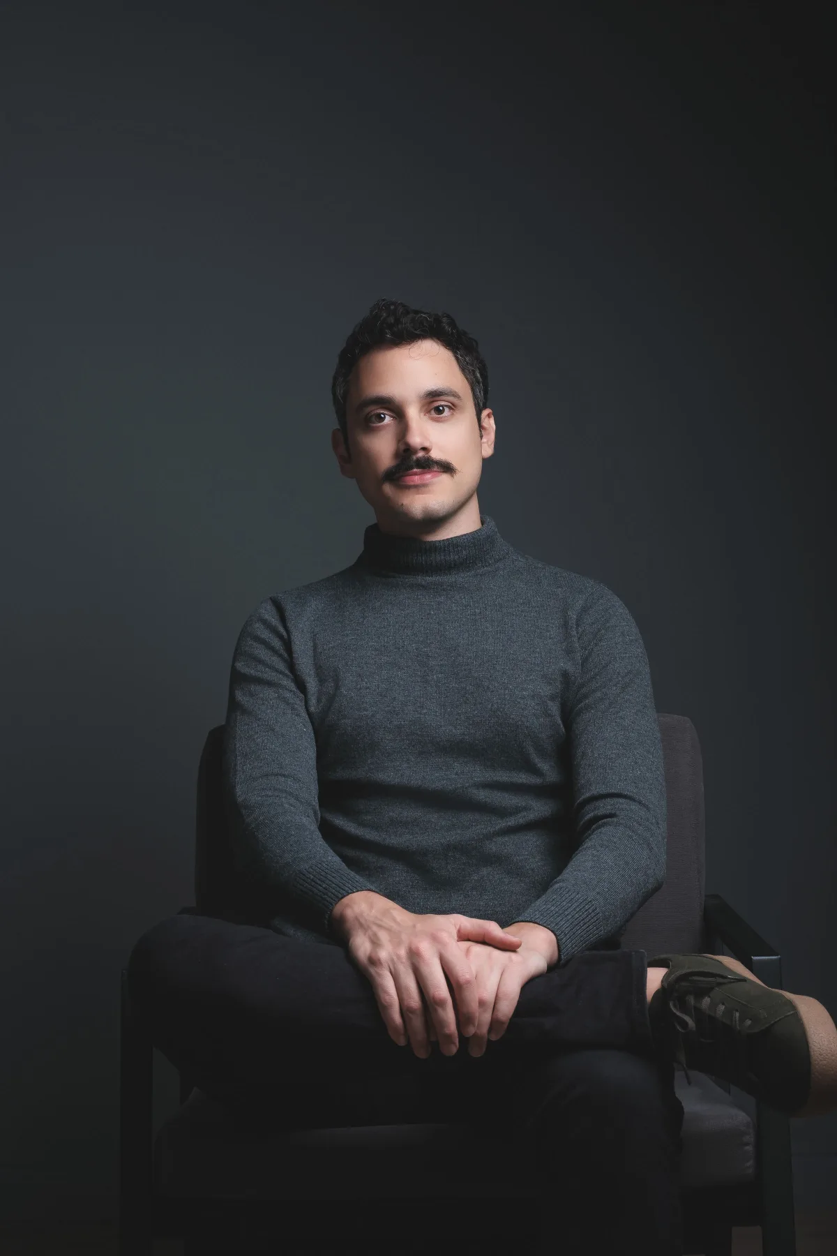 Professional portrait of Ricardo Nacif in a bright minimalist studio